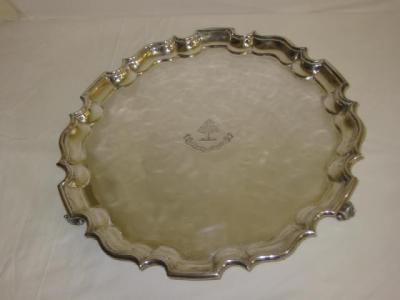 Appraisal: A TRAY of circular form with moulded Chippendale border chased