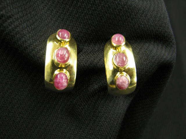 Appraisal: Ruby Earrings three cabachon gems in each k yellow gold