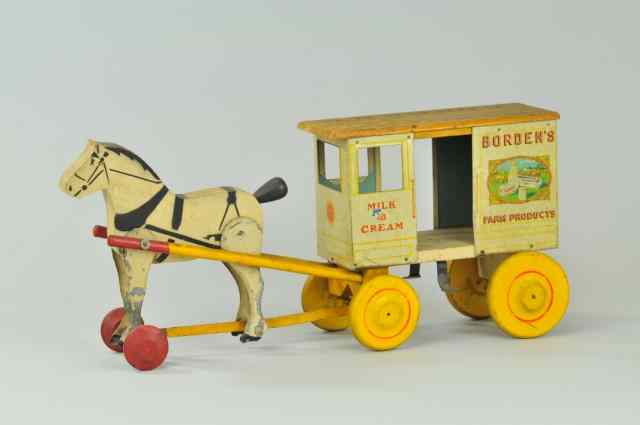 Appraisal: BORDEN'S MILK WAGON Rich Toys done in white tin litho