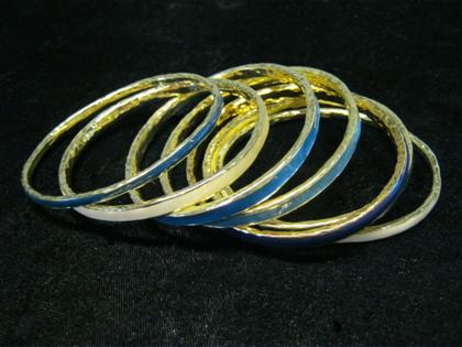 Appraisal: Group of karat yellow gold and enamel bangles IppolitaOne bangle