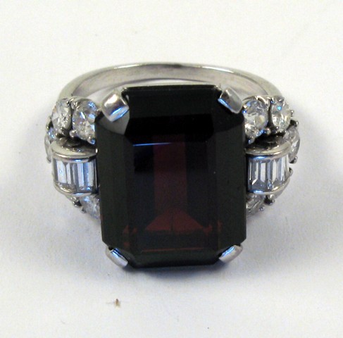 Appraisal: GARNET DIAMOND AND WHITE GOLD RING The k white gold