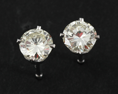 Appraisal: A pair of diamond stud earrings Each round brilliant cut