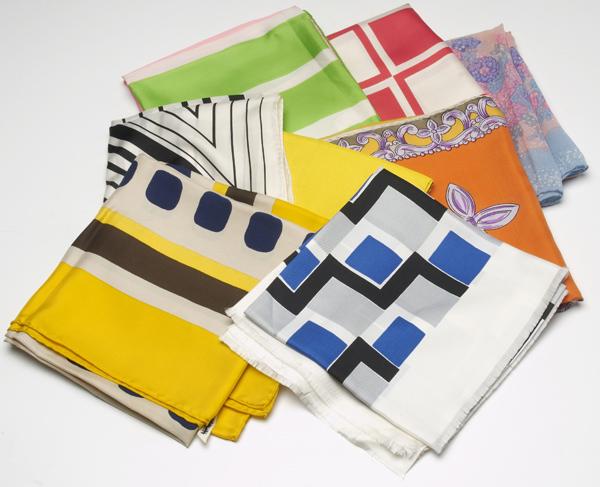 Appraisal: DESIGNER ACCESSORIES Eight silk scarves including Norell Yves Saint Laurent