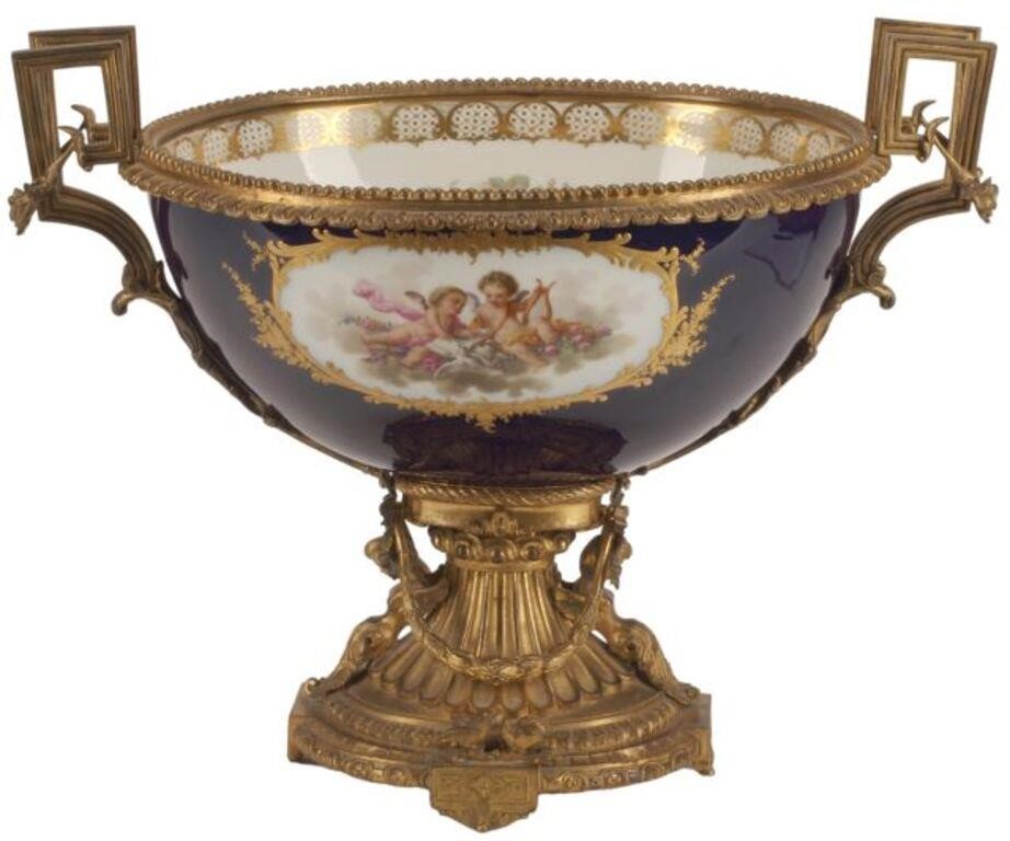 Appraisal: SEVRES STYLE ORMOLU-MOUNTED PORCELAIN CENTERPIECESevres style porcelain centerpiece with bronze