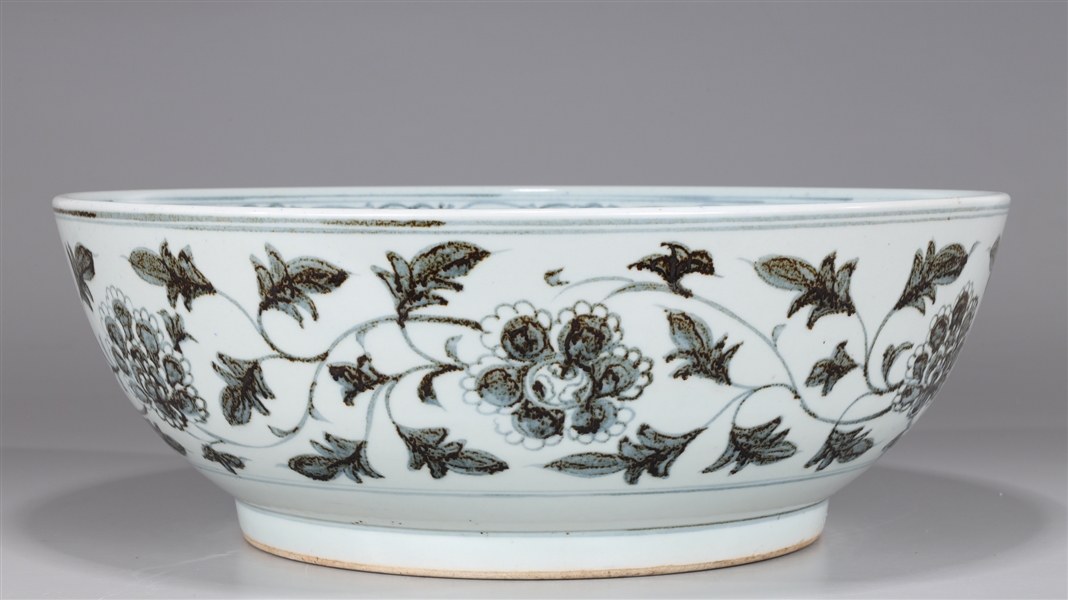 Appraisal: Large Chinese blue and white porcelain bowl with dragon to