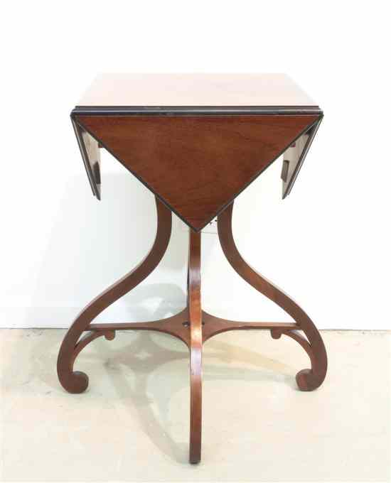 Appraisal: An American Mahogany Handkerchief Table Baker having a rectangular top