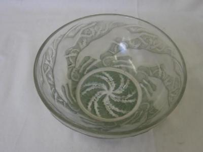 Appraisal: A LALIQUE FROSTED GLASS BOWL moulded in Chiens No with