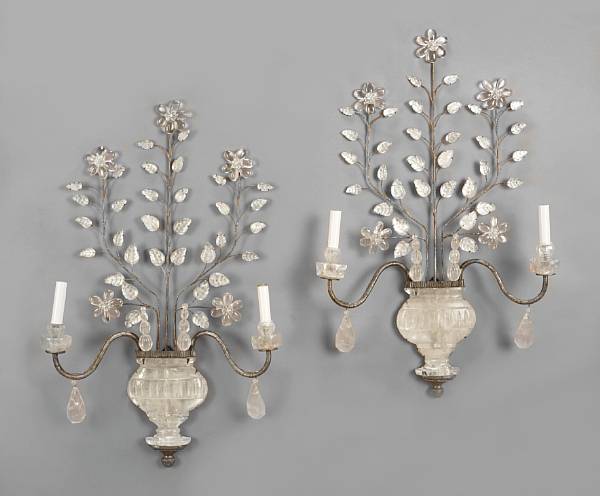 Appraisal: A pair of Neoclassical style rock crystal and silvered iron