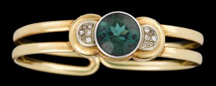 Appraisal: karat yellow gold tourmaline and diamond bangle braceletBezel set round