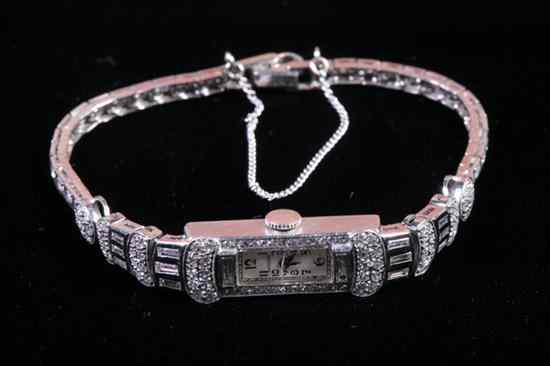 Appraisal: LADY'S ART DECO PLATINUM AND DIAMOND EVENING WATCH By Glycine