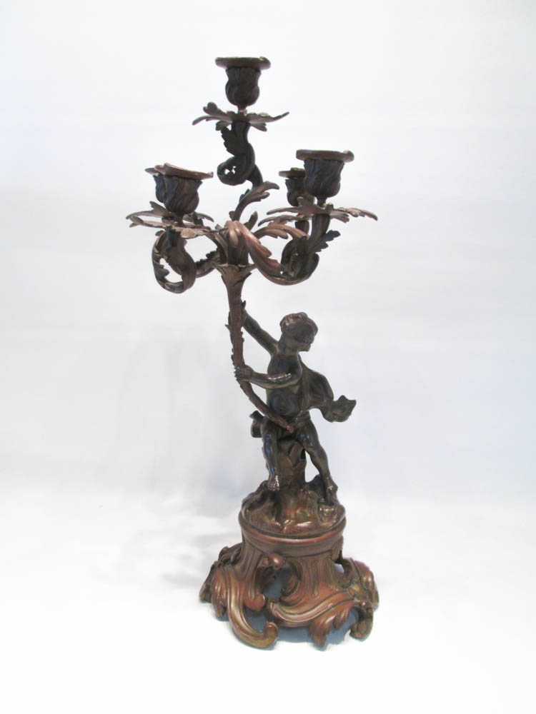 Appraisal: BRONZE FIGURAL CANDELABRUM five lights on foliate arms raised by