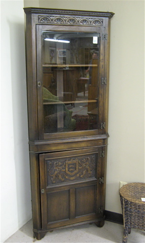 Appraisal: OLD ENGLISH STYLE OAK CORNER CHINA CABINET ON CABINET American