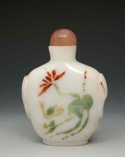 Appraisal: A CHINESE MILK GLASS SNUFF BOTTLE flowers in overglazed enamels