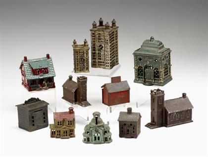 Appraisal: Group of cast-iron miniature coin bank buildings th century Comprising