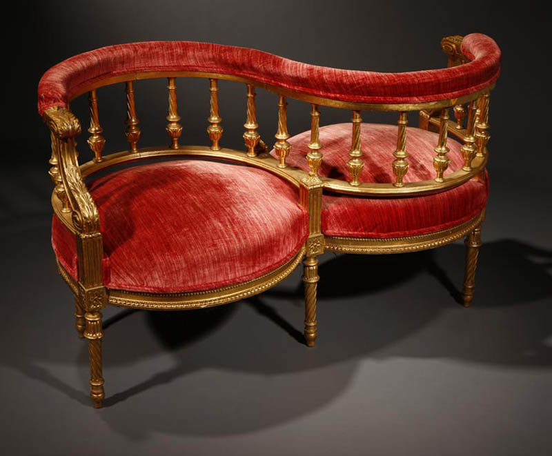 Appraisal: A Louis XVI style giltwood ''tete-a-tete'' A Louis XVI style