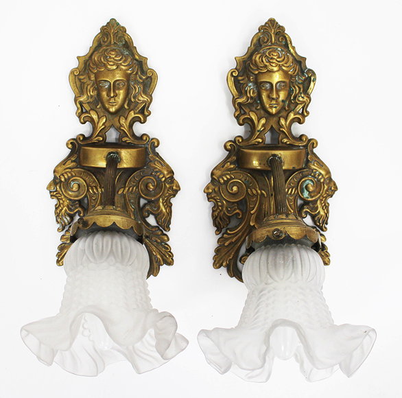 Appraisal: A PAIR OF ART NOUVEAU BRASS WALL LIGHTS with white