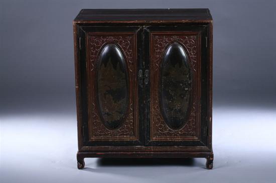 Appraisal: CHINESE LACQUERED ELMWOOD CABINET Of rectangular outline with two doors