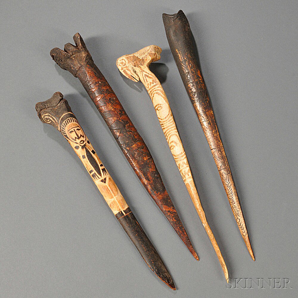 Appraisal: Four New Guinea Bone Daggers all with incised decoration lg