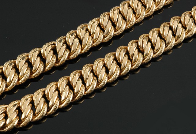 Appraisal: A gold collar The double curblink with engraved border links