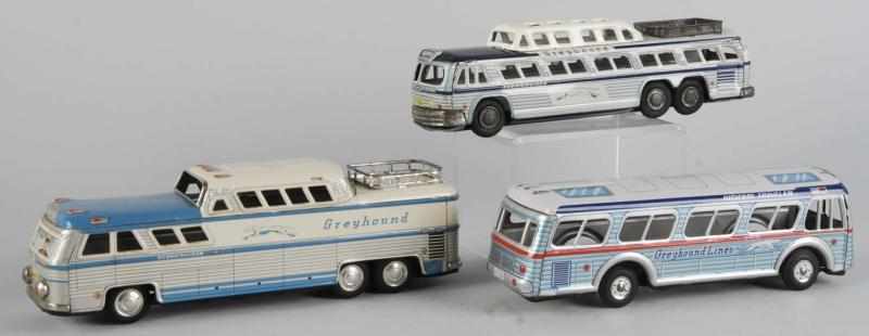 Appraisal: Lot of Tin Litho Greyhound Bus Friction Toys Description Japanese