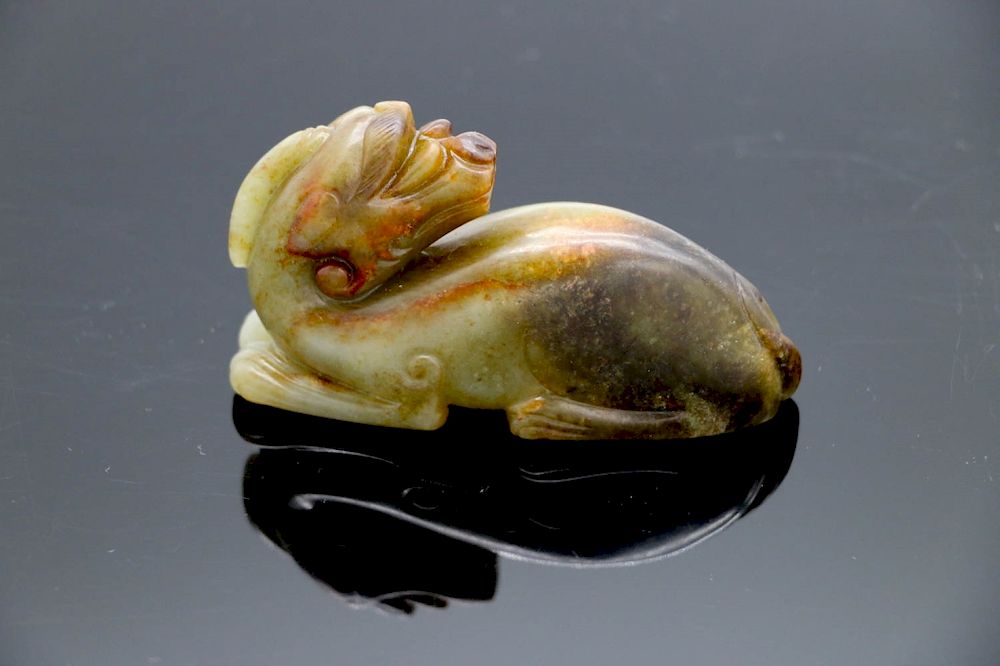 Appraisal: CELADON JADE BEAST CARVING A celadon jade model of a