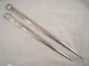 Appraisal: A set of two silver plated meat skewers crested with