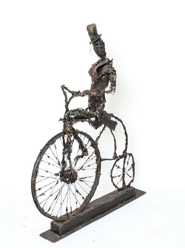 Appraisal: Modern Man on Bicycle Mixed Media Metal Sculpture Modern Man