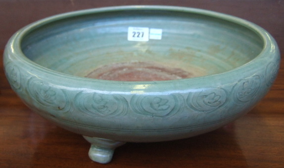 Appraisal: A Chinese celadon glazed tripod censer Ming dynasty - of