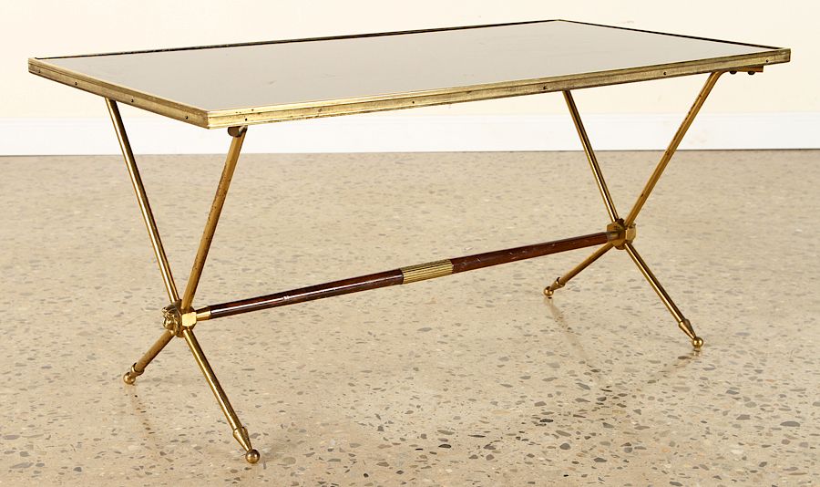 Appraisal: MID CENTURY MODERN BRASS BLACK GLASS COFFEE TABLE A mid