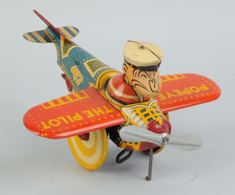 Appraisal: Marx Tin Litho Wind-Up Popeye Airplane Toy version Original tail