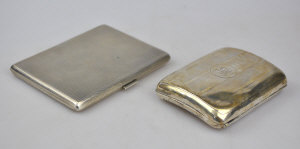 Appraisal: An engine-turned cigarette case Neale Son Birmingham and another cigarette