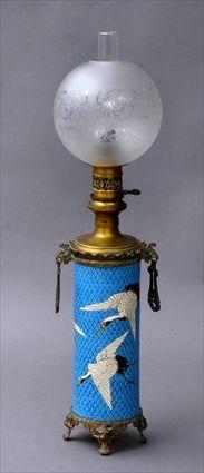 Appraisal: FRENCH FLUID LAMP IN THE JAPANESE-STYLE The cylindrical body with