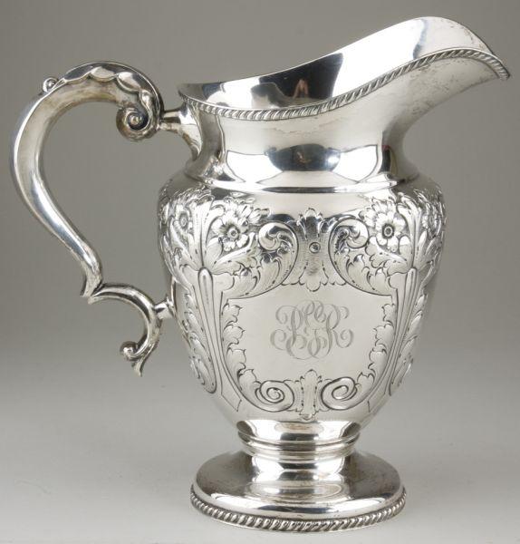 Appraisal: Sterling Silver Water Pitcher hand-chased with floral and scrolls gadrooned