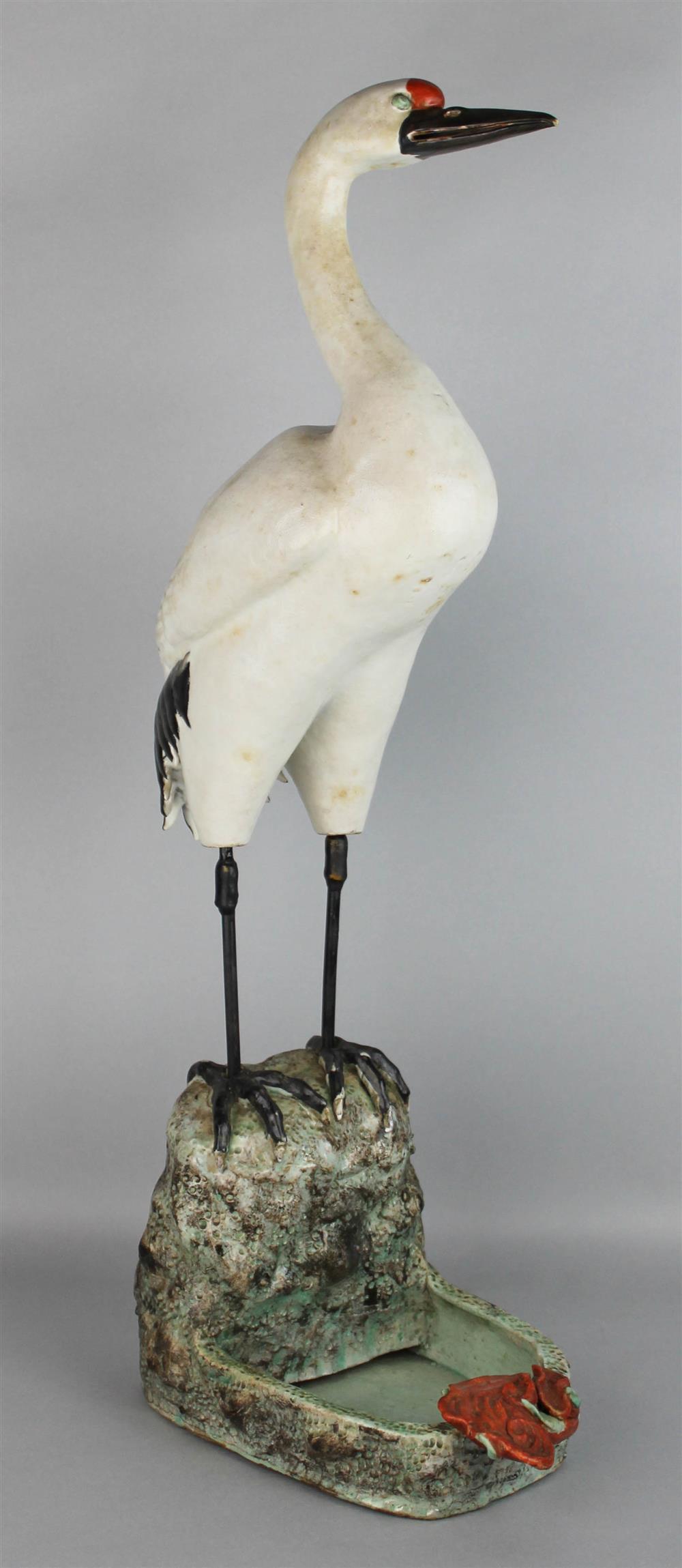 Appraisal: CHINESE CERAMIC MODEL OF A CRANE the molded bird perched