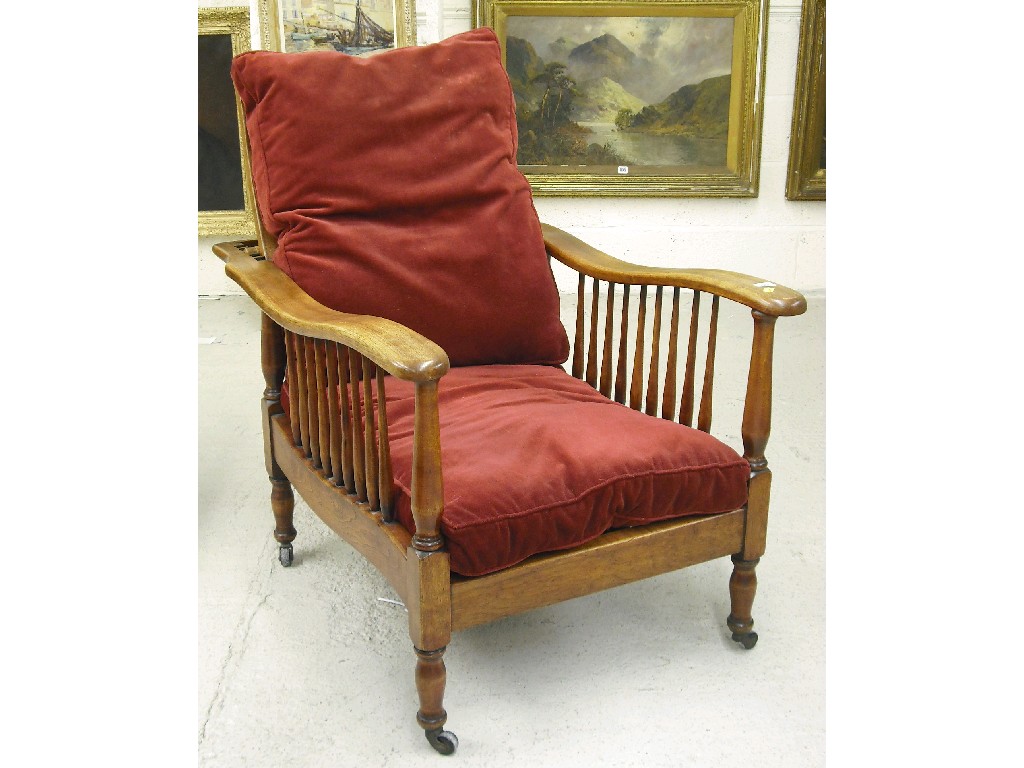 Appraisal: Edwardian mahogany adjustable reclining chair supported upon baluster turned legs