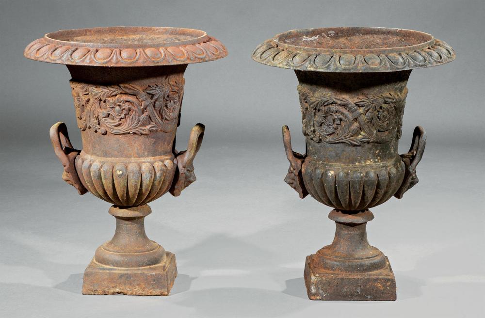 Appraisal: Pair of American Cast Iron Urns th c egg-and-dart molding