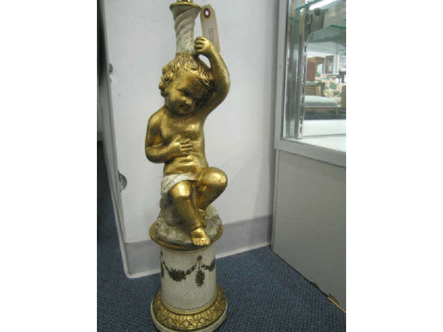 Appraisal: Figural Pottery Lamp of a Child