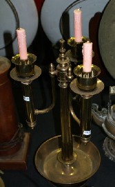 Appraisal: An Edwardian brass three branch candelbra together with two brass