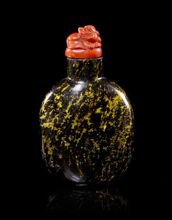 Appraisal: A Chinese Glass Snuff Bottle of compressed globular form having