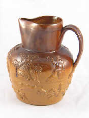 Appraisal: A mid th century salt glazed Harvest jug with traditional