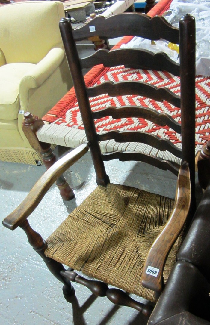 Appraisal: An ash and elm ladder back open armchair