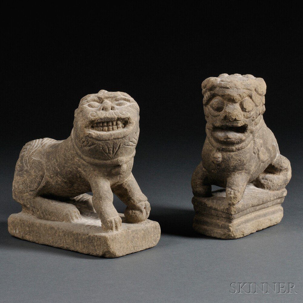 Appraisal: Two Stone Foo Lions China Ming Dynasty or later each