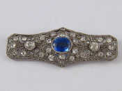 Appraisal: A white metal tests carat gold Art Deco sapphire and