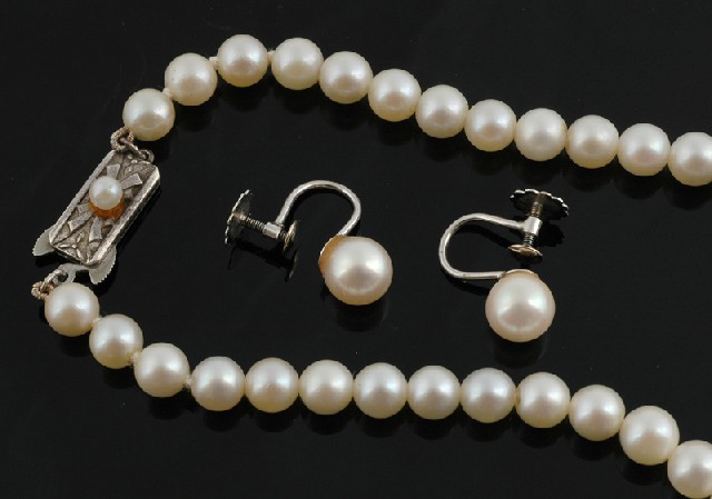 Appraisal: A Mikimoto pearl necklace Comprising sixty two round cultured pearls