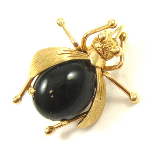 Appraisal: BLACK JADE AND YELLOW GOLD BEETLE BROOCH The k gold