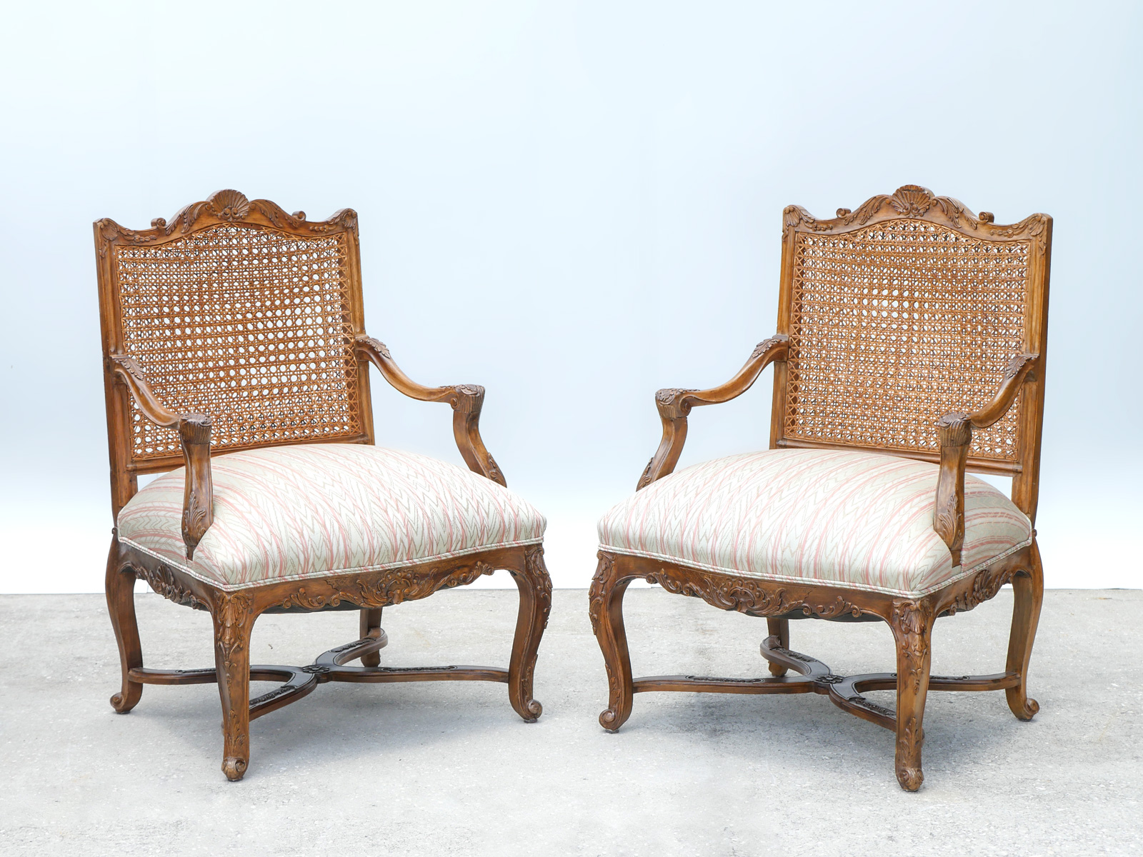 Appraisal: PAIR OF FRENCH CANE BACK ARMCHAIRS French cane back chairs