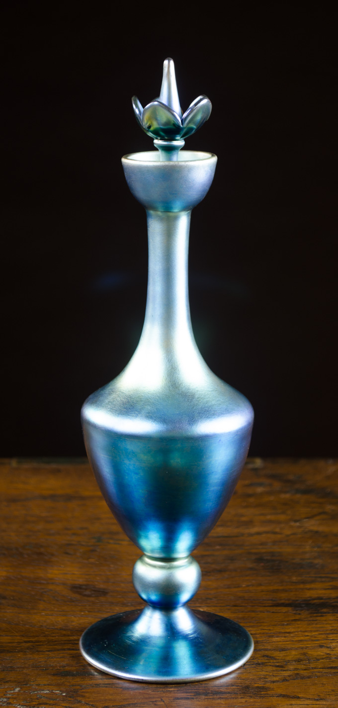 Appraisal: STEUBEN AURENE FOOTED ART GLASS PERFUME BOTTLE iridescent blue with