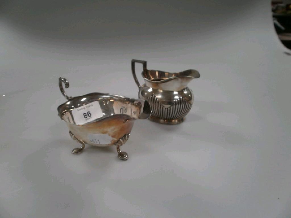 Appraisal: A small Elkington silver sauceboat and a plated example