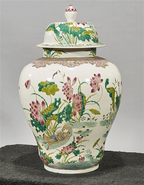 Appraisal: Tall Chinese enameled porcelain covered vase with pond scene decoration