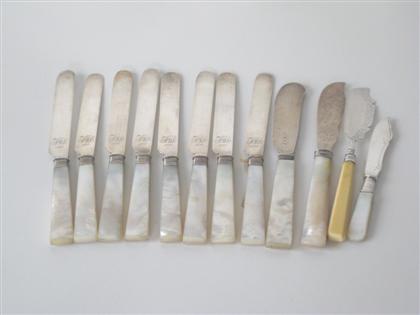 Appraisal: Eight mother-of-pearl handled silver luncheon knives late th century Plain